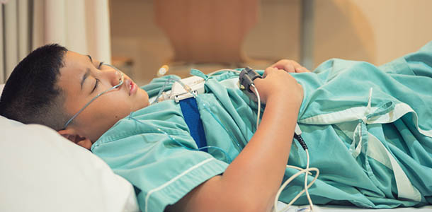 sleep study - young man in hospital bed