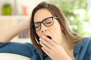 narcolepsy - woman yawning