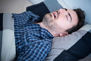 sleep apnea - man snoring